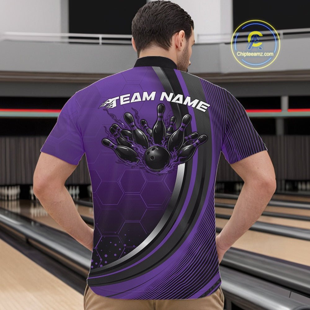 Male model in a bowling alley wearing a black and purple quarter zip shirt, showcasing honeycomb texture with a flaming bowling ball hitting pins.