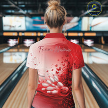 Load image into Gallery viewer, Female model in a white and red bowling quarter zip featuring butterfly graphics and bowling artwork, back view