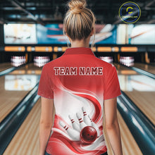 Load image into Gallery viewer, Female model standing in a bowling lane showing the back of a white and red bowling polo shirt with abstract wave lines and a glossy bowling ball striking pins graphic.
