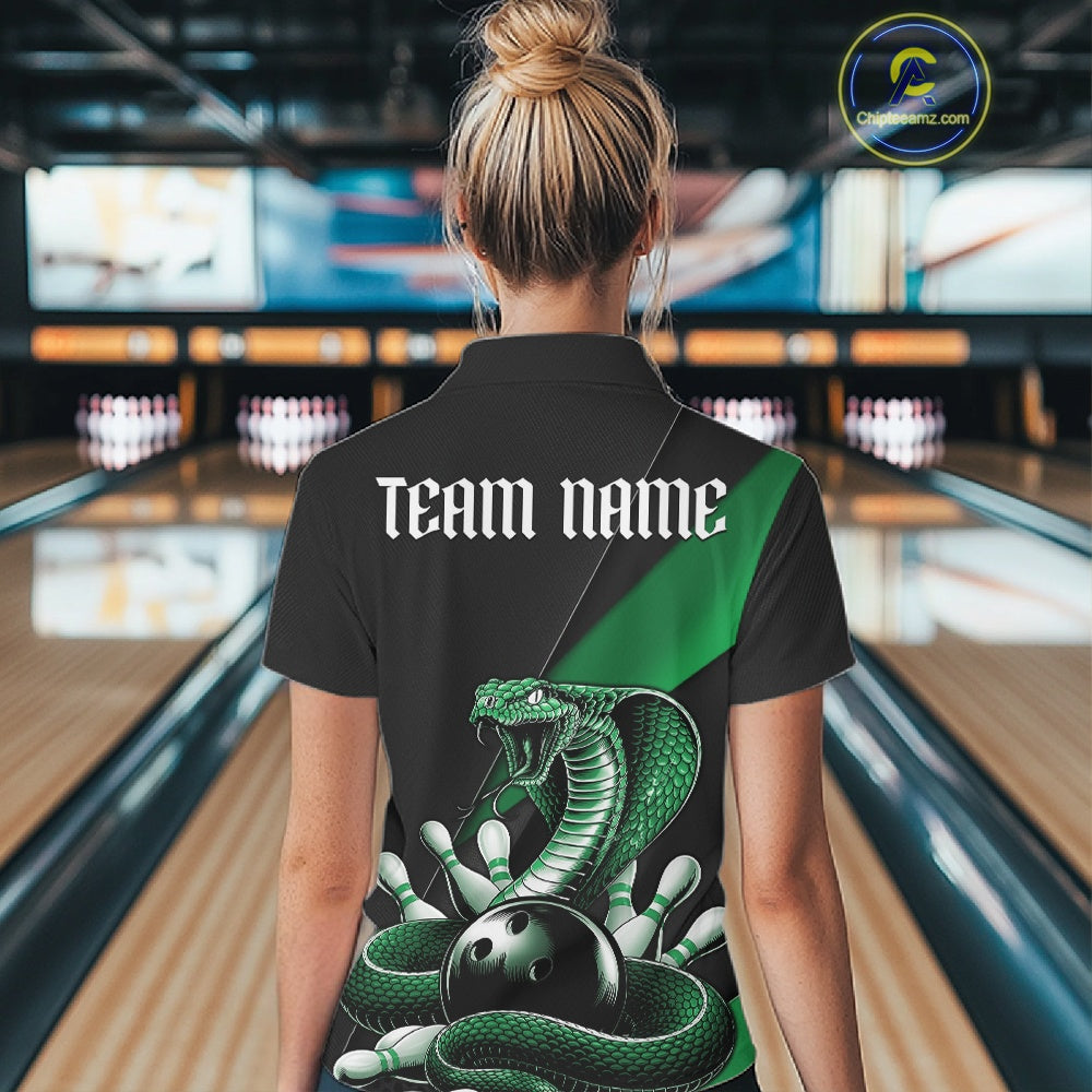 Back view of a black womens bowling polo showcasing a green cobra, bowling ball, and scattered pin graphics.