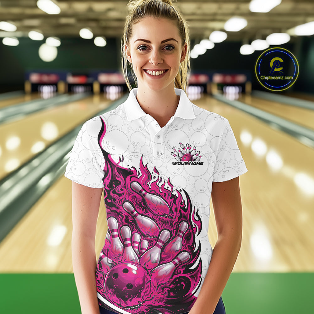 Female model in bowling lane wearing polo shirt with flaming bowling ball crashing into pins pink fiery sports artwork
