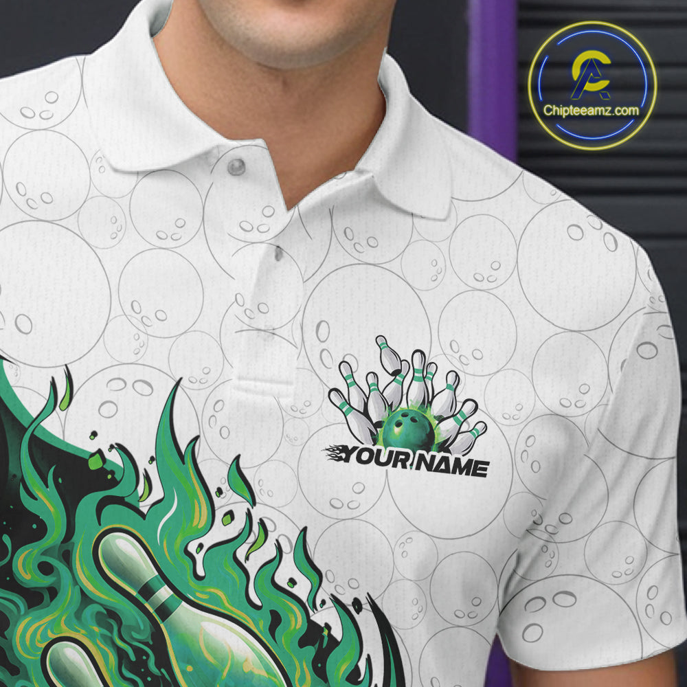 Close-up of the left chest on a white and green bowling polo featuring a flaming bowling strike motif.