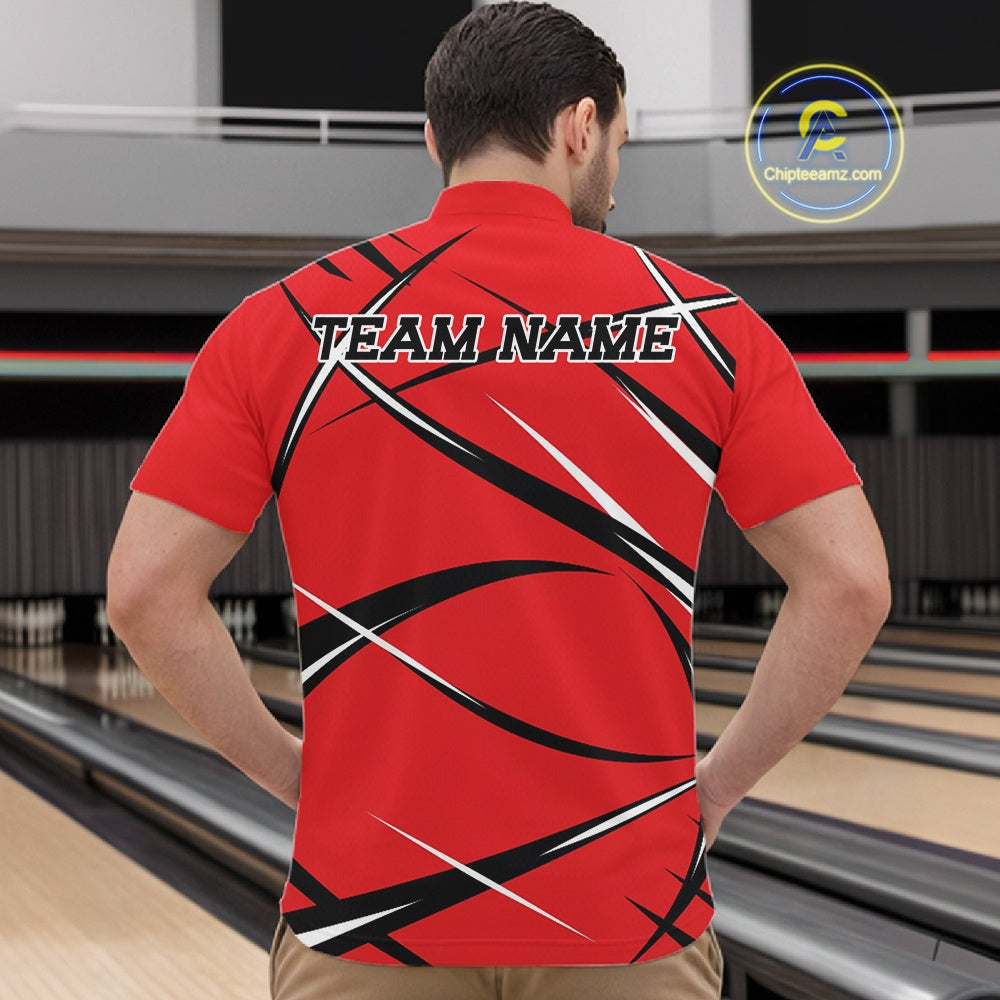 Front view of a male bowler in a bowling alley wearing a red, black, and white bowling quarter zip shirt with an athletic jersey design