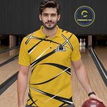 Load image into Gallery viewer, Front view of a male bowler in a bowling alley wearing a yellow, black, and white bowling polo shirt with an athletic jersey pattern