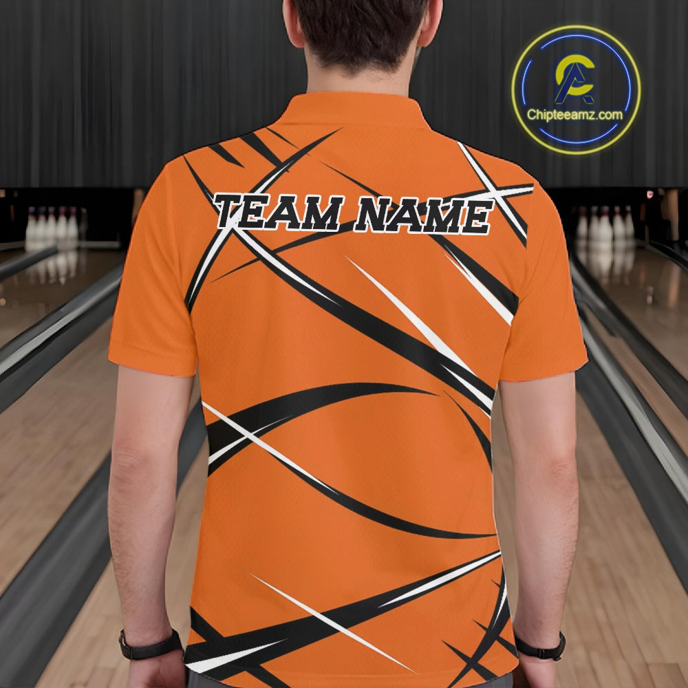 Back view of a male bowler wearing an orange, black, and white bowling polo shirt in a bowling lane
