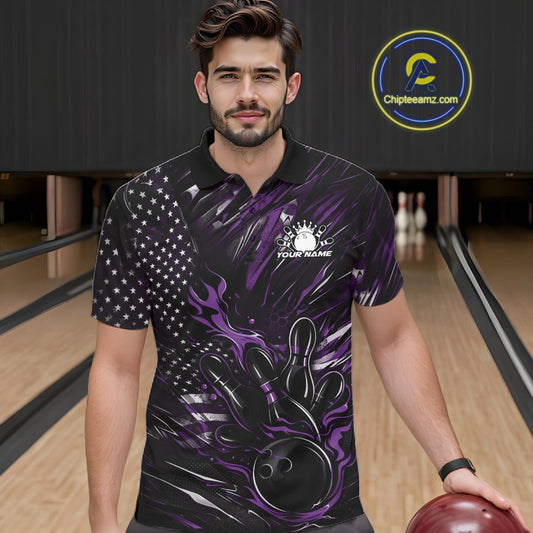Male model at a bowling lane wearing a black and purple bowling polo shirt with fiery bowling strike graphics and patriotic styling.