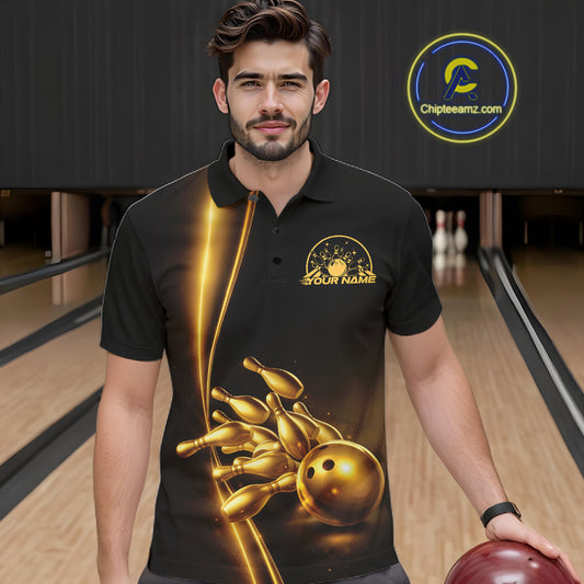 In bowling lane front view male model wearing bowling polo shirt, black base with golden bowling ball and pins graphic, energetic sports lighting