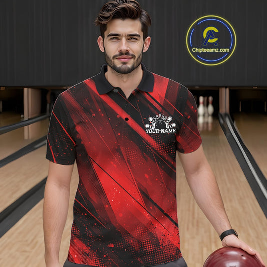 Man wearing a red and black bowling shirt with a logo on a bowling alley.