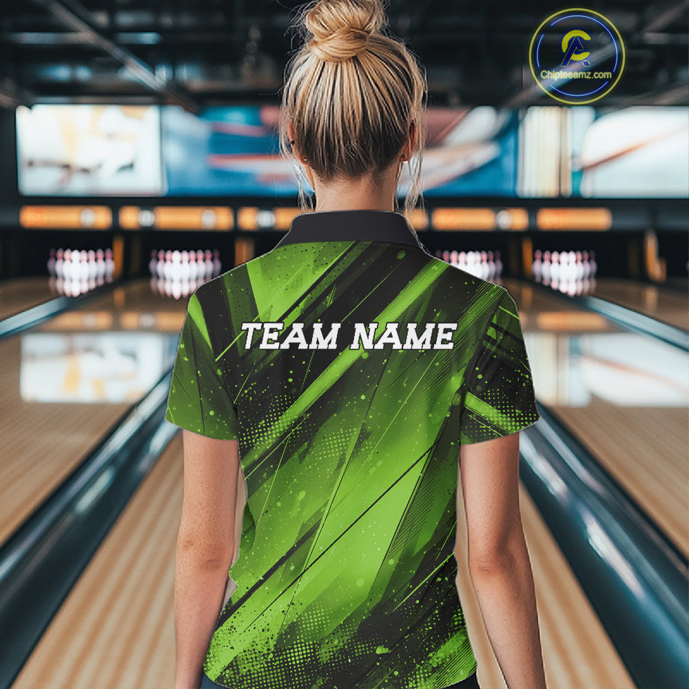 Person wearing a green and black bowling shirt with 'TEAM NAME' text in a bowling alley.