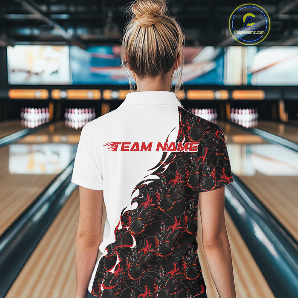 Back view female model in bowling center wearing white polo shirt with red and black flame bowling pattern, relaxed stance at lane