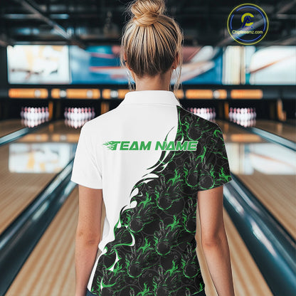 Back view of a female model in a bowling lane wearing a white polo shirt featuring green and black flame bowling pattern with clean athletic bowling design.