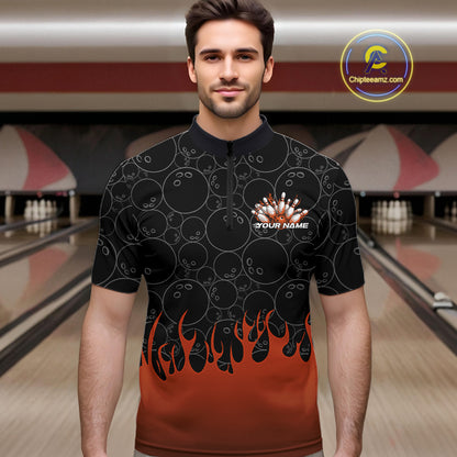 Male model in a bowling lane wearing black quarter zip shirt, front view featuring orange flames rising with bowling ball pattern and energetic sports design