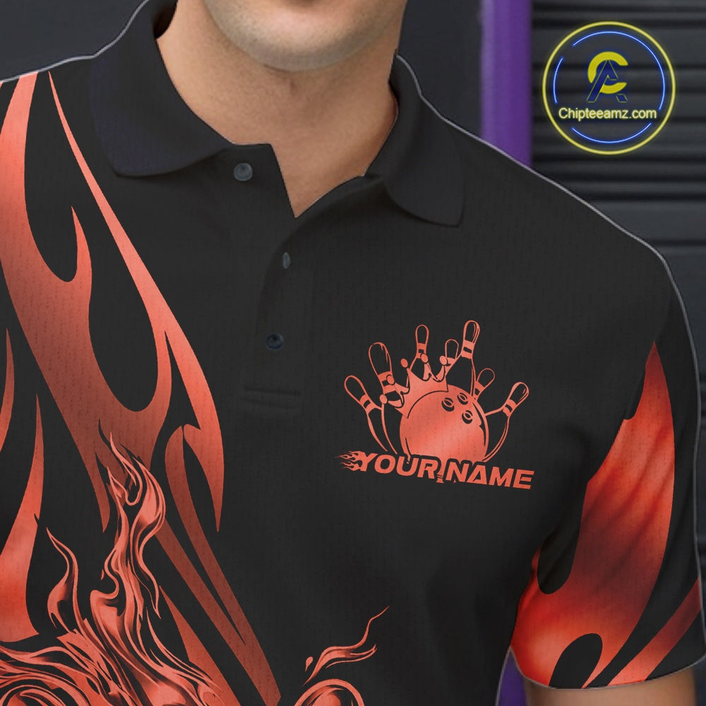 Close-up view of the left chest area of a black polo shirt showing a red gradient tribal flame bowling ball and pins design detail.