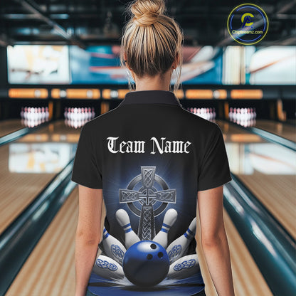 Back view female model at bowling alley wearing black quarter zip shirt with blue Celtic cross and bowling ball impact illustration