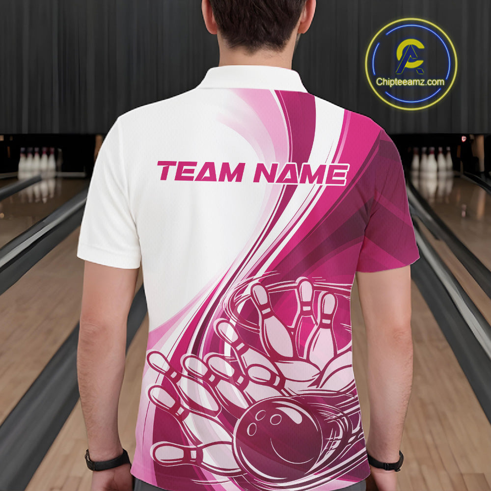Back view of a male model in a bowling alley wearing a white and pink polo shirt, showcasing a sweeping curve bowling strike graphic with pins being knocked down.