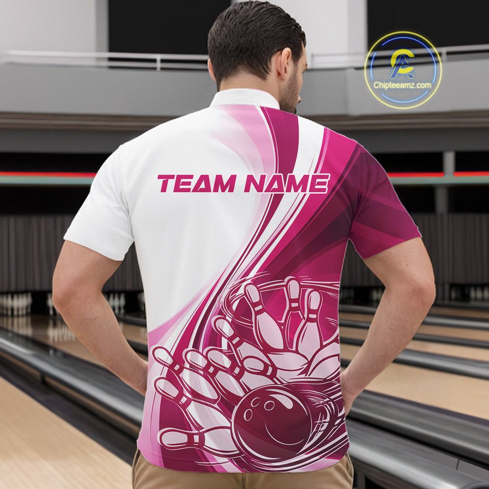 Male model in a bowling lane wearing a white and pink quarter zip bowling shirt, featuring a dynamic sweeping curve graphic with a bowling ball crashing into pins.