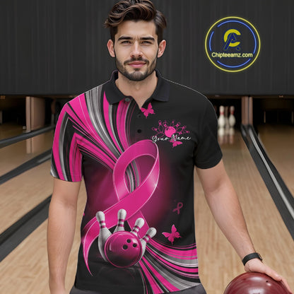 Front view of a male model in a black and pink bowling polo with breast cancer awareness ribbons, small butterflies, and bowling artwork