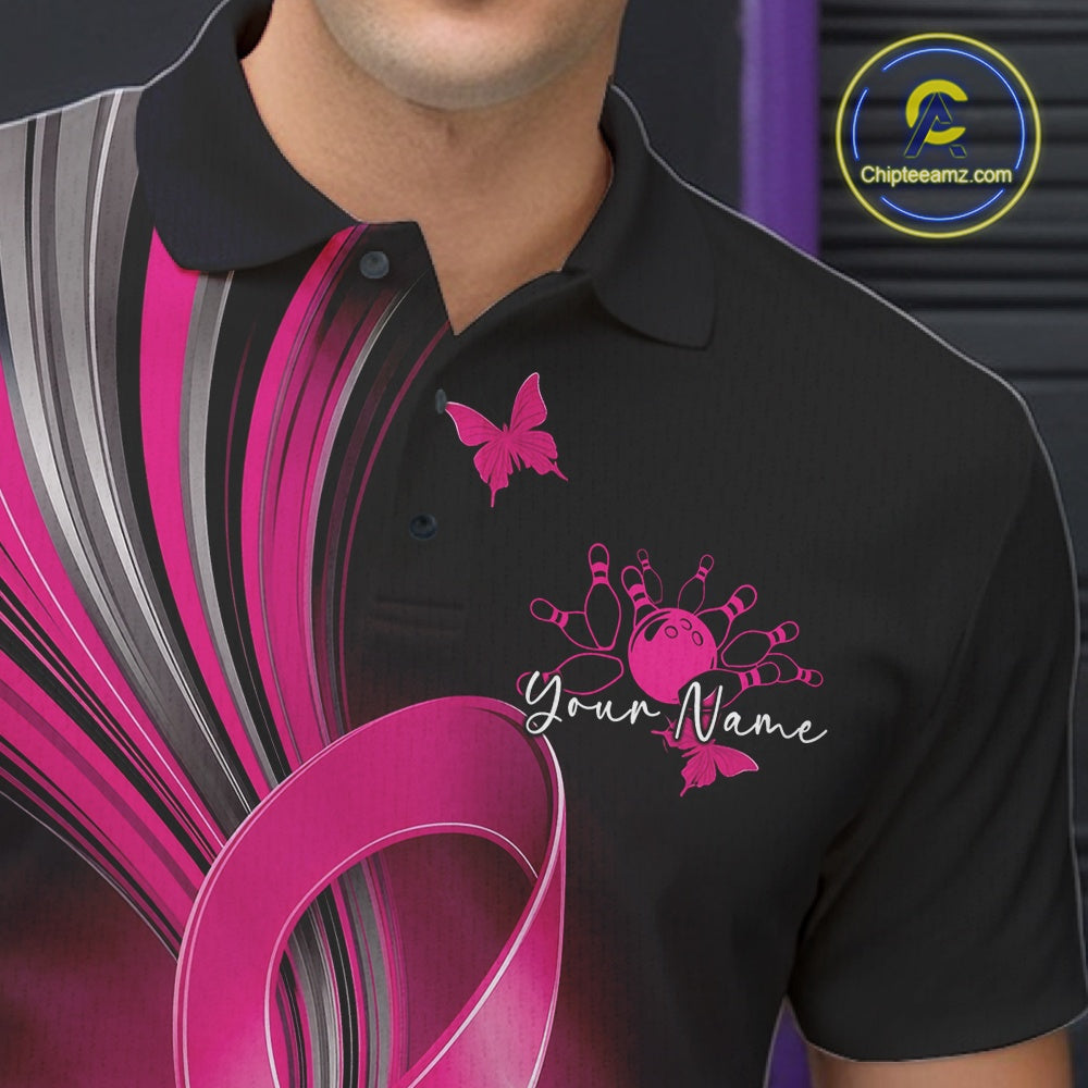 Close-up left chest view of a black and pink bowling polo featuring breast cancer awareness ribbons, small butterflies, and bowling graphics