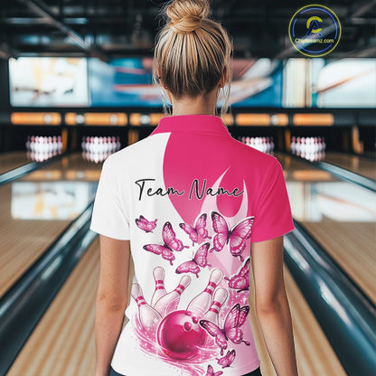 Back view of a female model wearing a white and pink bowling polo with butterfly graphics and bowling-themed artwork