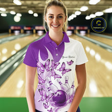 Load image into Gallery viewer, Front view of a female model in a white and purple bowling polo with butterfly artwork and bowling graphics