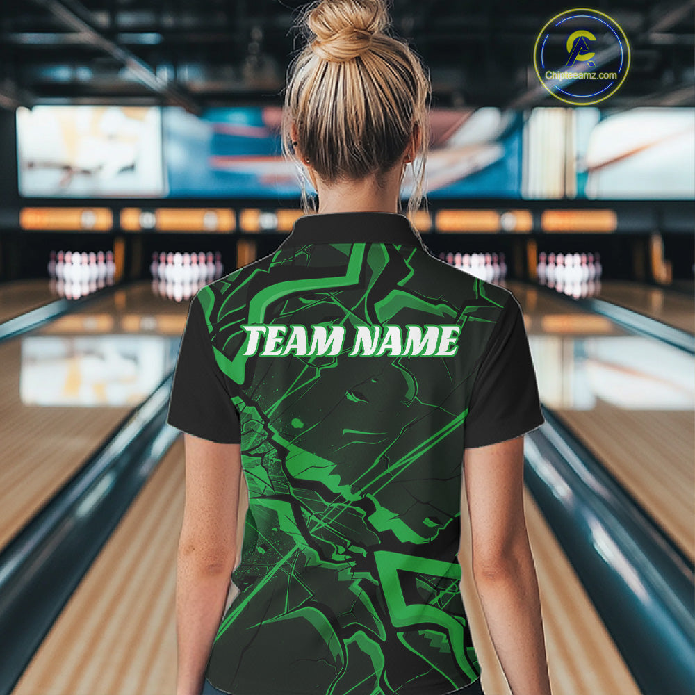 Back view of a womens black and green bowling polo showcasing sharp angular lines and futuristic pattern details.
