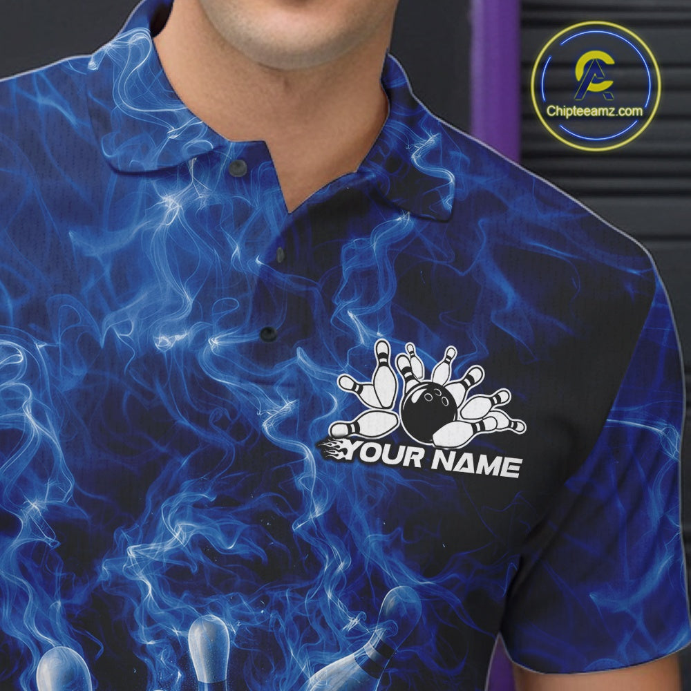 Left chest detail of a bowling polo featuring a blue bowling ball hitting pins with flame accents.