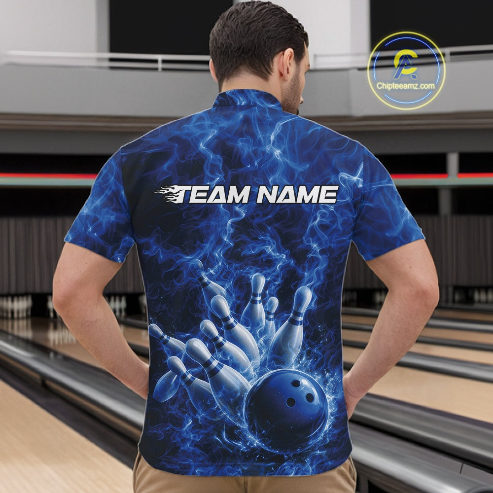 Front view of a mens bowling quarter-zip showcasing a blue bowling ball striking pins with fiery accents.