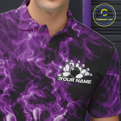 Close-up left chest detail of a bowling polo featuring a purple bowling ball hitting pins with flames.