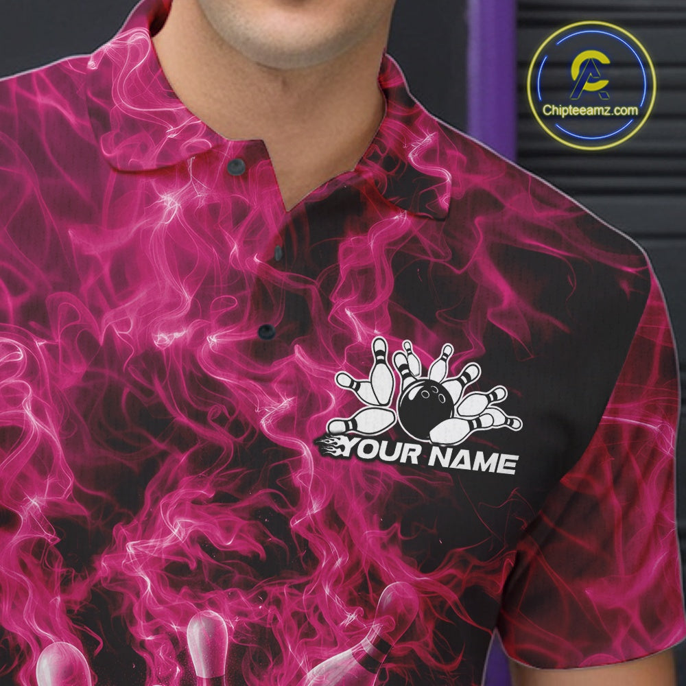 Left chest close-up of a bowling polo featuring a pink bowling ball crashing through pins with flame accents.