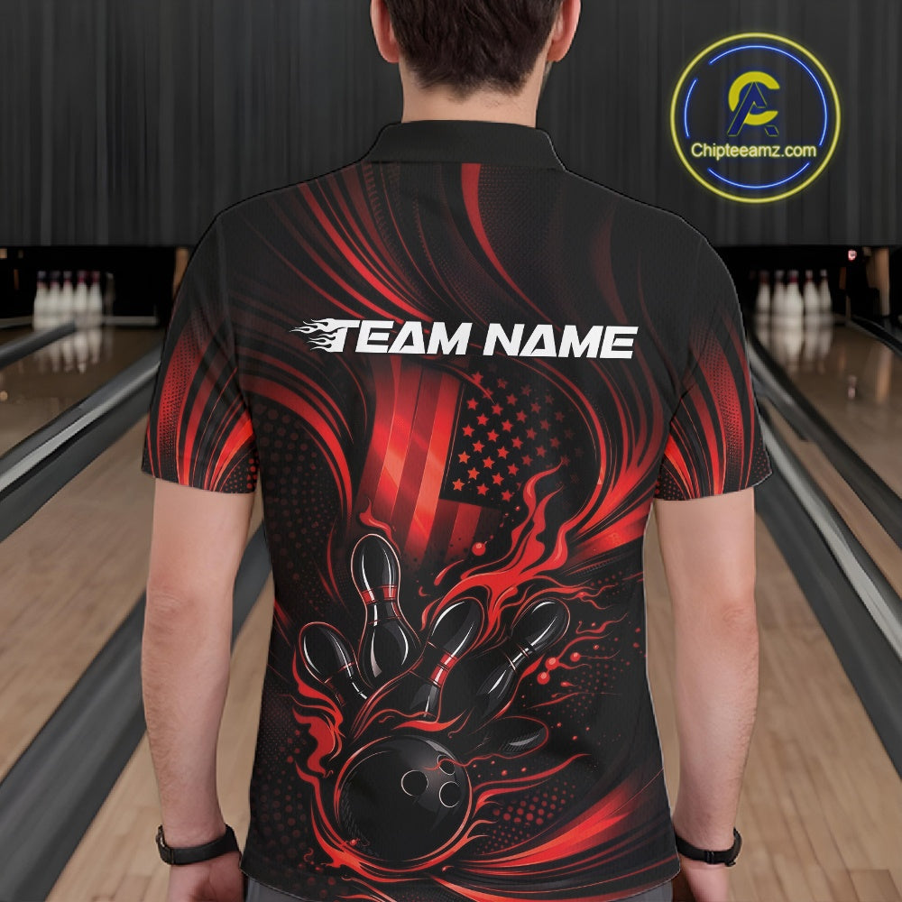 Front view of a male model in a bowling alley wearing a black and red polo featuring a flaming bowling ball and pin strike design.