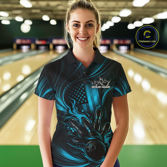 Female model wearing a black and turquoise blue bowling polo at a bowling lane with patriotic bowling strike artwork and flame effects.