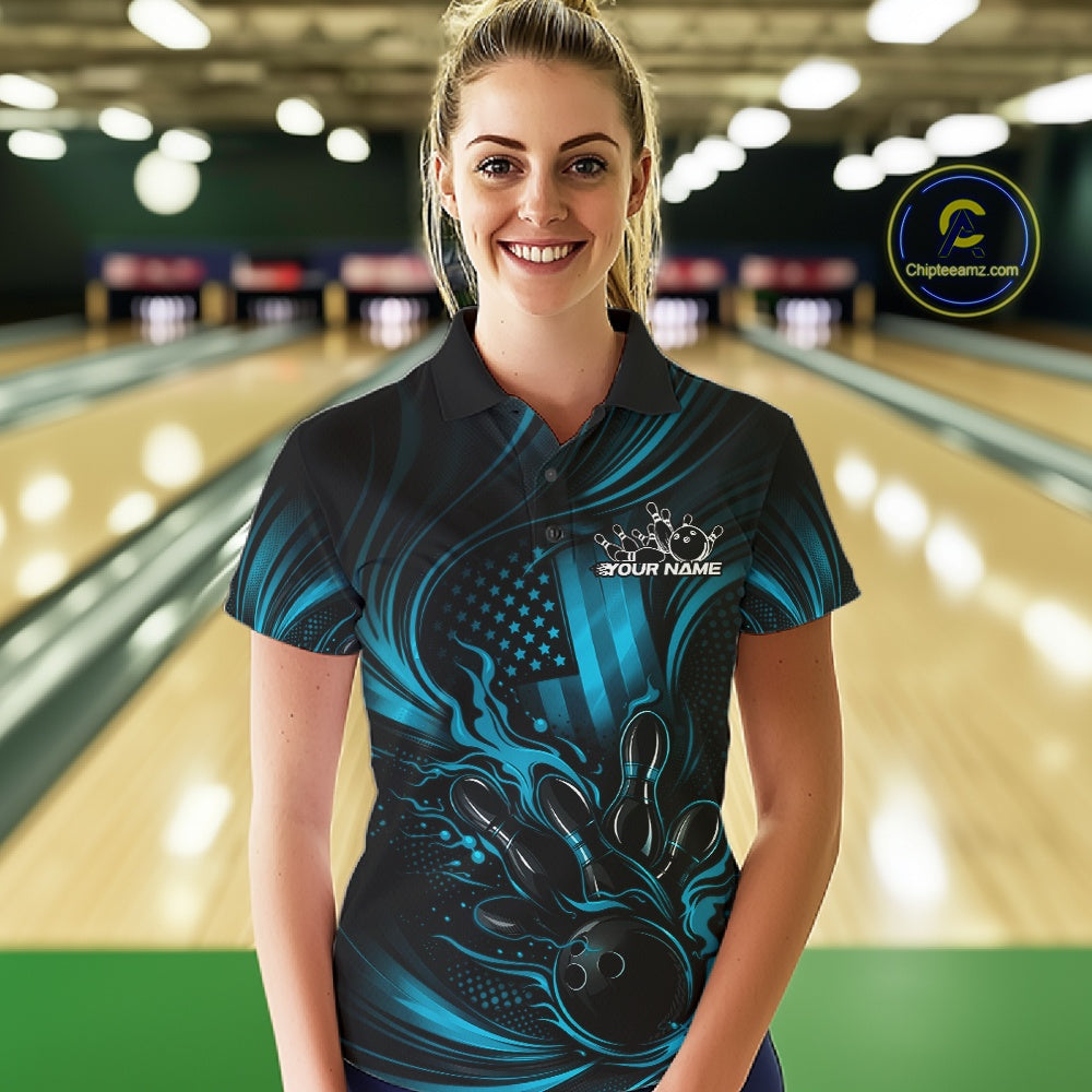 Female model wearing a black and turquoise blue bowling polo at a bowling lane with patriotic bowling strike artwork and flame effects.