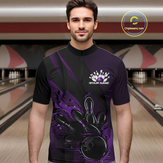 Male model wearing a black and purple bowling quarter-zip shirt at a bowling lane with fiery bowling action artwork, geometric patterns, and diagonal stripe accents.
