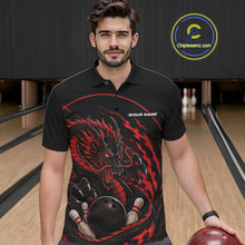 Load image into Gallery viewer, Front view of a male model in a bowling alley wearing a red custom bowling polo shirt featuring an aggressive dragon with flames in a dynamic and energetic design.