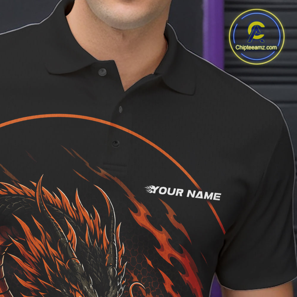 Close-up front view of the left chest area on an orange custom bowling polo shirt featuring an aggressive dragon with flames in a dynamic and energetic design.