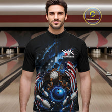 Load image into Gallery viewer, Male model front view at the bowling lane wearing a quarter zip shirt with a bald eagle gripping a blue bowling ball and flying pins.