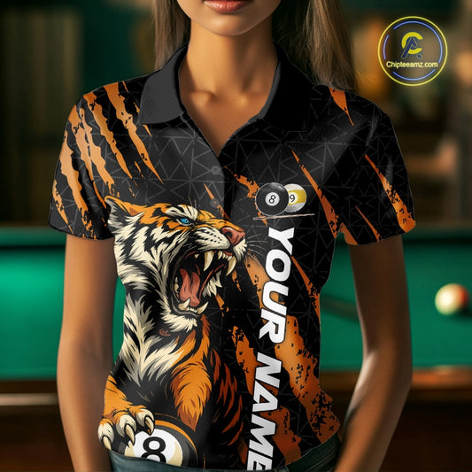 Female model front view wearing a Billiard polo shirt with roaring tiger graphics, orange claw marks, and billiard balls.