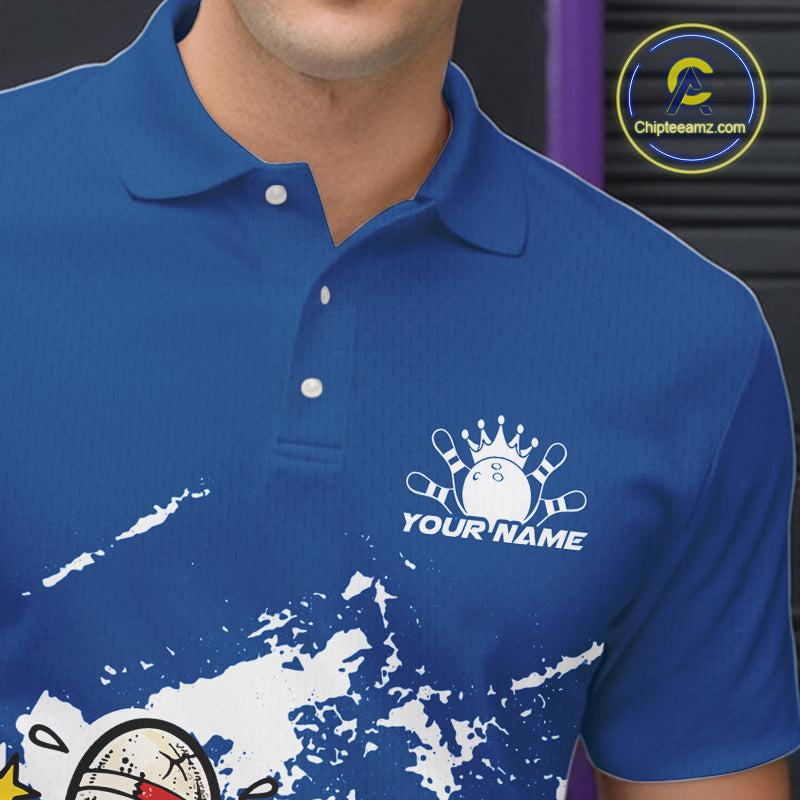Close-up view of left chest area of a blue and white polo shirt, showing small detailed boxing bowling ball and pin graphic.