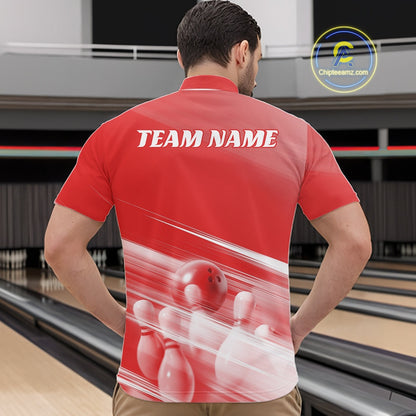 Front view of a male model at the bowling lane wearing a red quarter zip shirt with bowling ball and pins over a pink geometric background.
