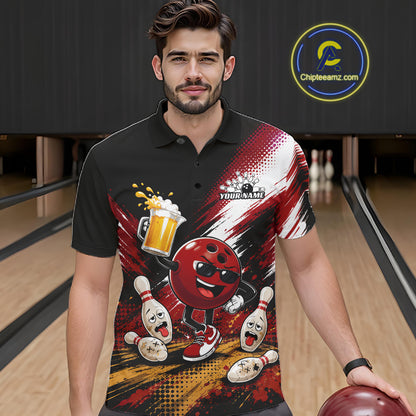 A man wearing a black short-sleeve polo shirt with a bold bowling-themed graphic print featuring a red bowling ball character, pins, beer, and a customizable name patch. The background shows a blurred bowling alley with lanes and pins.