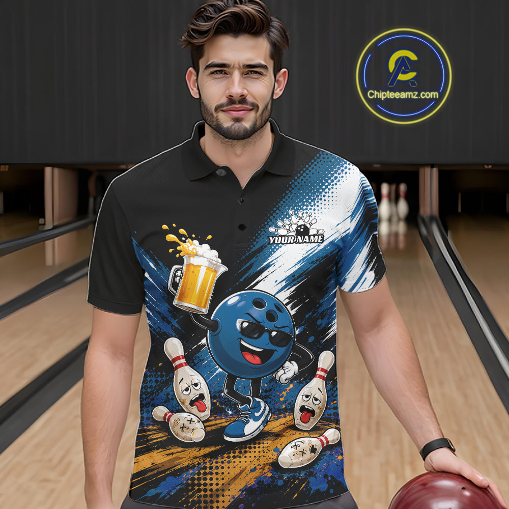 A man wearing a black short-sleeve polo shirt with a colorful bowling-themed graphic print, standing in a bowling alley holding a bowling ball. The shirt features a blue cartoon bowling ball character, bowling pins, a beer mug, and a 'YOURNAME' placeholder logo on the chest.
