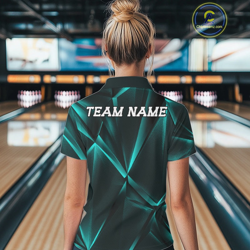 Person wearing a green bowling shirt with 'TEAM NAME' on the back in a bowling alley.