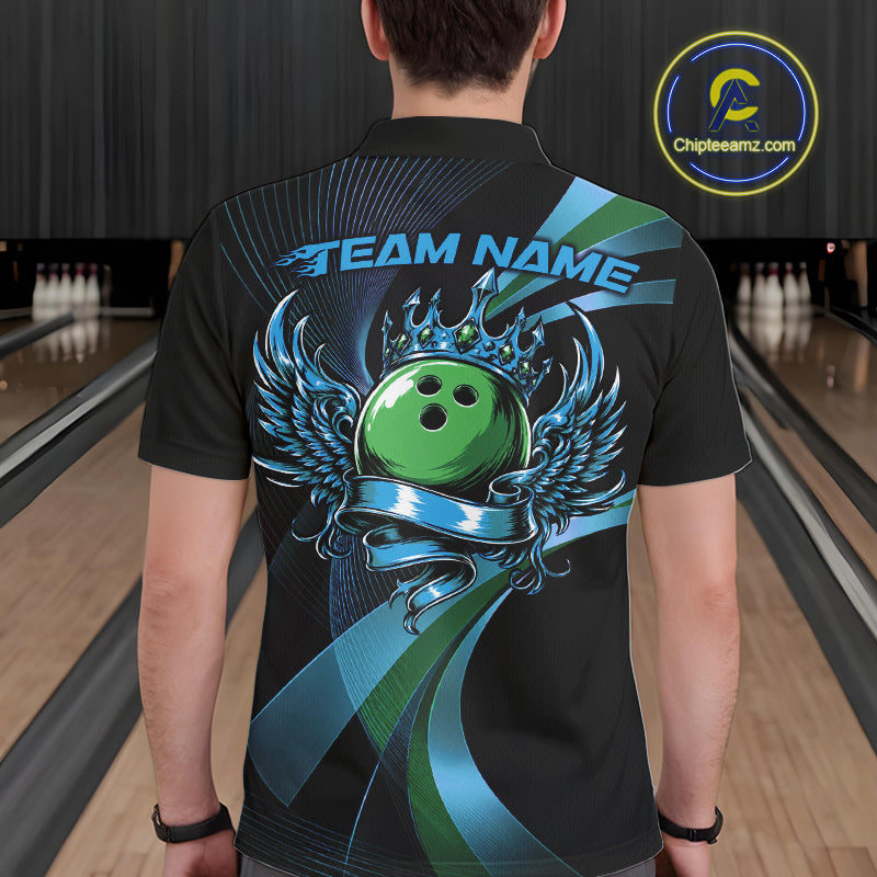 Person wearing a black bowling shirt with a green bowling ball design in a bowling alley.