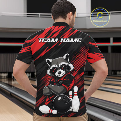 A man viewed from behind wearing a custom bowling-themed short-sleeve quarter zip shirt with a raccoon graphic and 'TEAM NAME' text on the back, set against a bowling alley background.