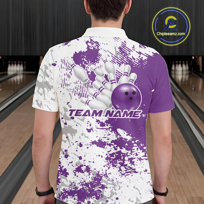 Back view of a male model in a bowling lane wearing a purple and white splatter polo shirt featuring minimalist bowling-inspired design accents.