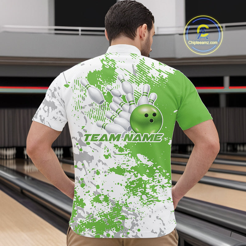 Male model at a bowling lane wearing green and white quarter zip shirt, front view featuring green splatter background with minimal abstract sports design