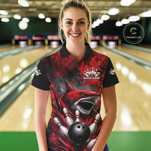 Load image into Gallery viewer, Woman wearing a red and black bowling shirt with a shark design in a bowling alley.