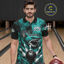 Load image into Gallery viewer, Man wearing a teal bowling shirt with shark design in a bowling alley.