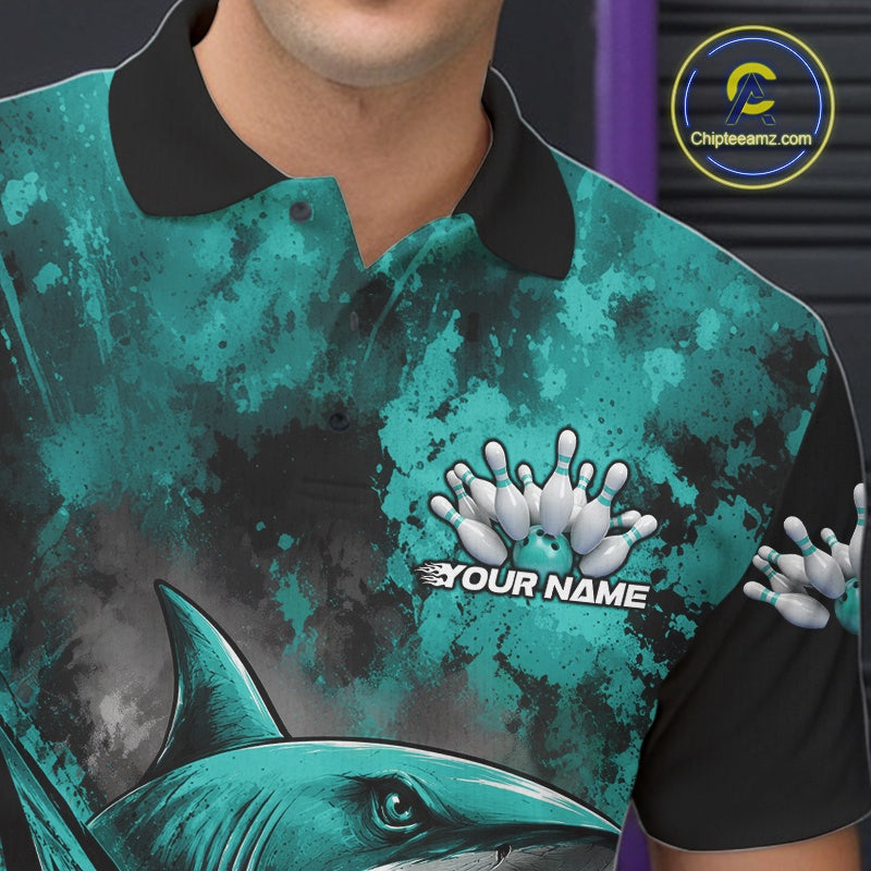 Teal and black polo shirt with shark design and 'Your Name' text, brand logo visible