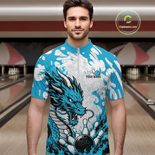 Load image into Gallery viewer, Man wearing a blue and white dragon-themed bowling shirt in a bowling alley.